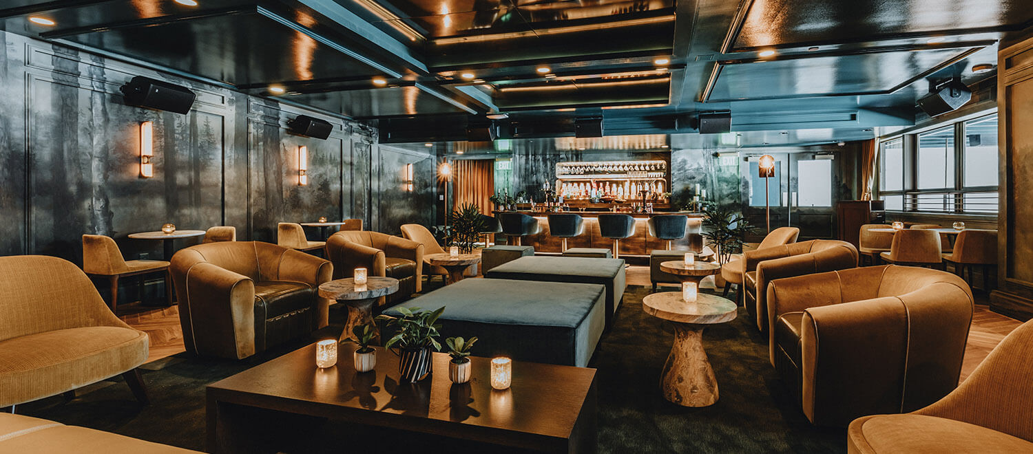 Lounge area with candles and tin ceilings
