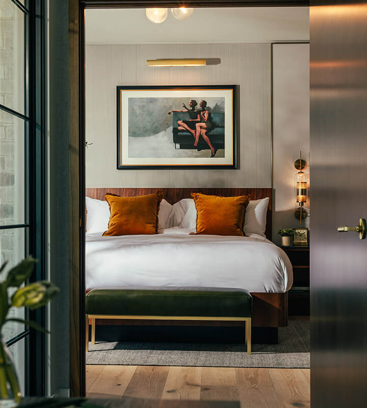 Bedroom detail with black and gold accents