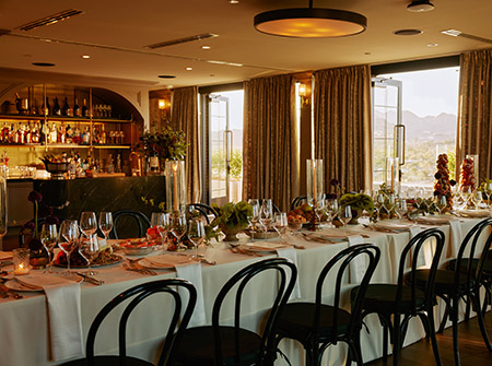 Set table for an event with indoor outdoor setting