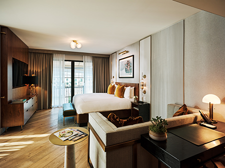 Bedroom, soft lighting, and natural wood accents